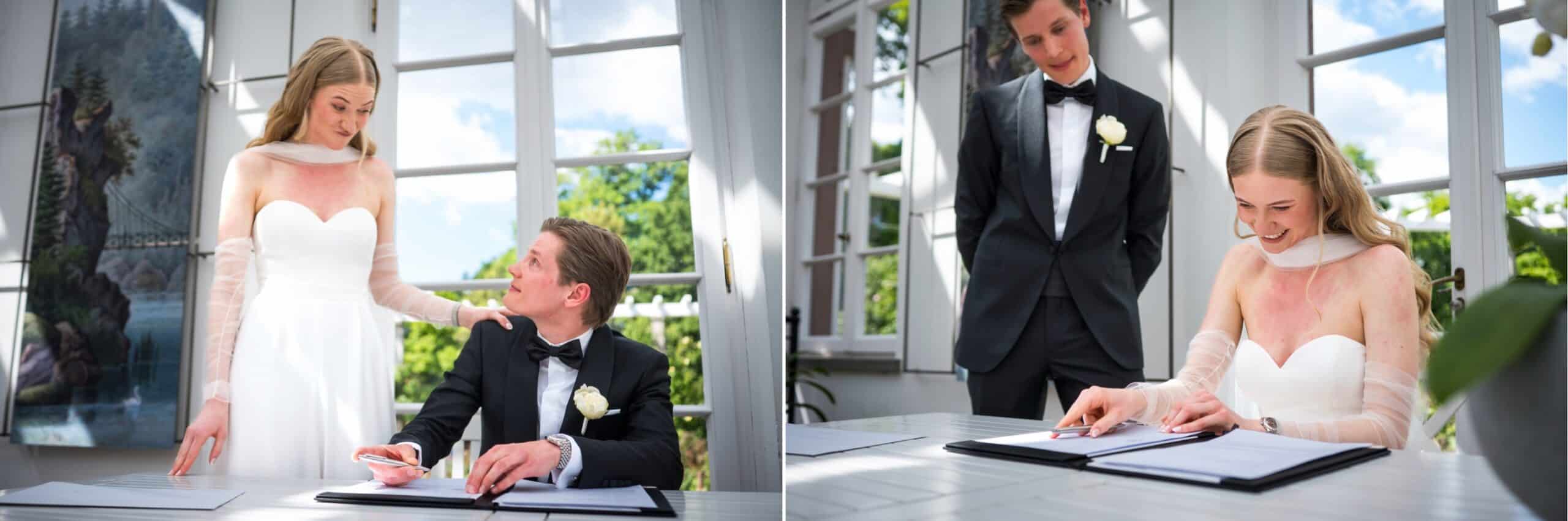 Brautpaar unterschreibt die Eheurkunde im Haus Rosenbrunn des Standesamt Palmengarten