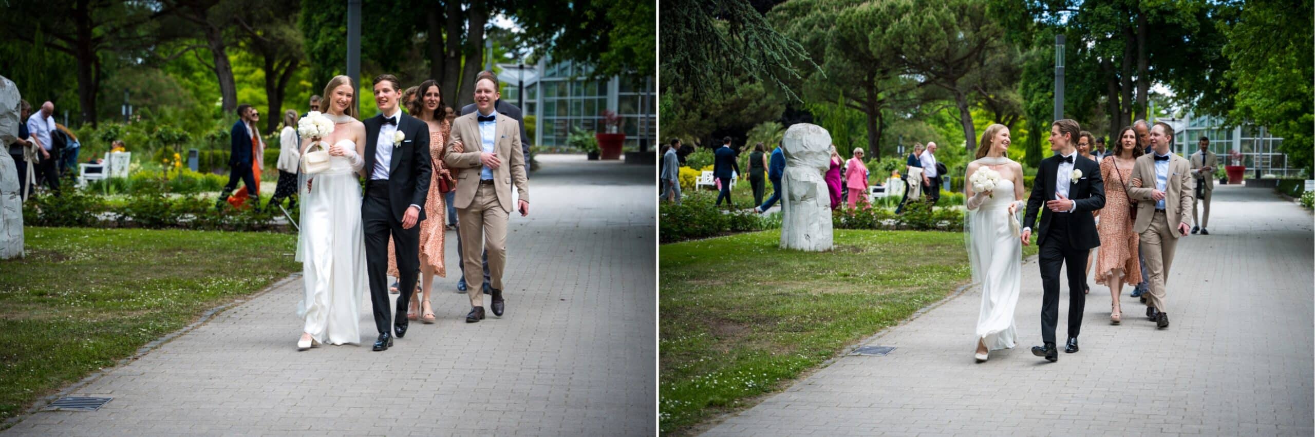 Brautpaar und Hochzeitsgäste auf dem Weg zum Gästehaus schlendernd im Palmengarten